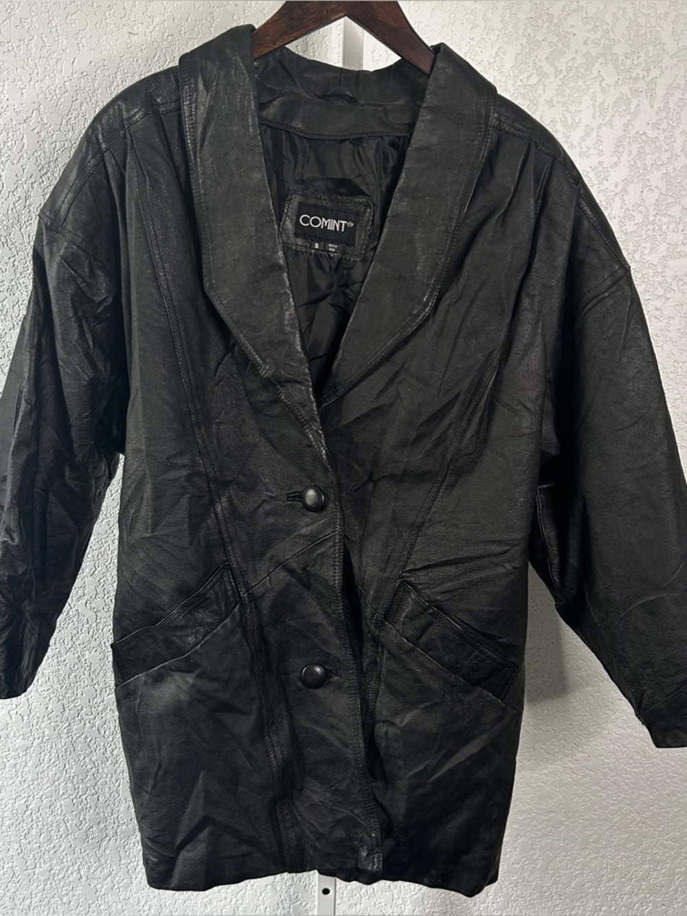 106. Women’s COMINT Leather Coat